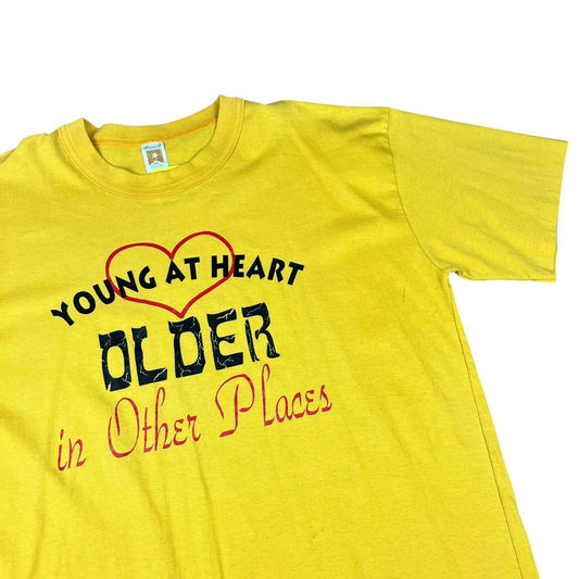 Funny Slogan - Young at Heart Older in Other Places - comedy T-shirt