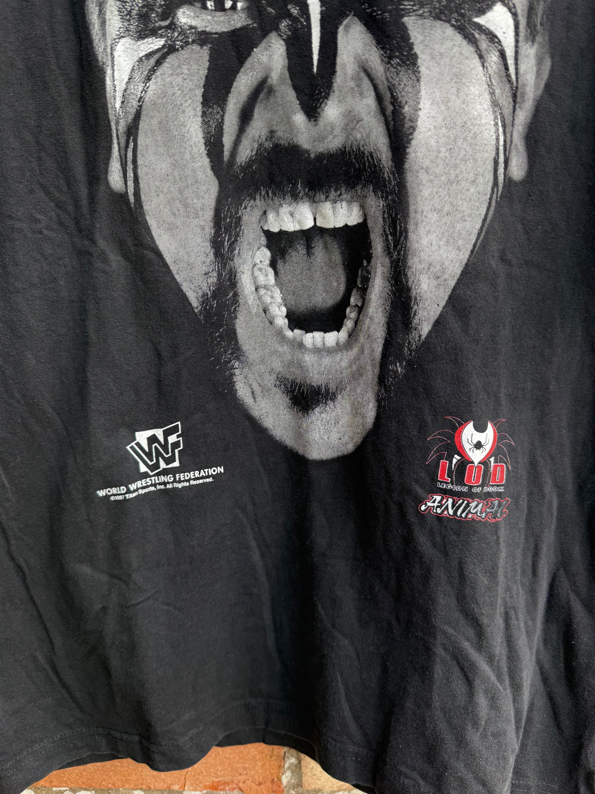 Black t-shirt with LOD Animal face image and WWF logo