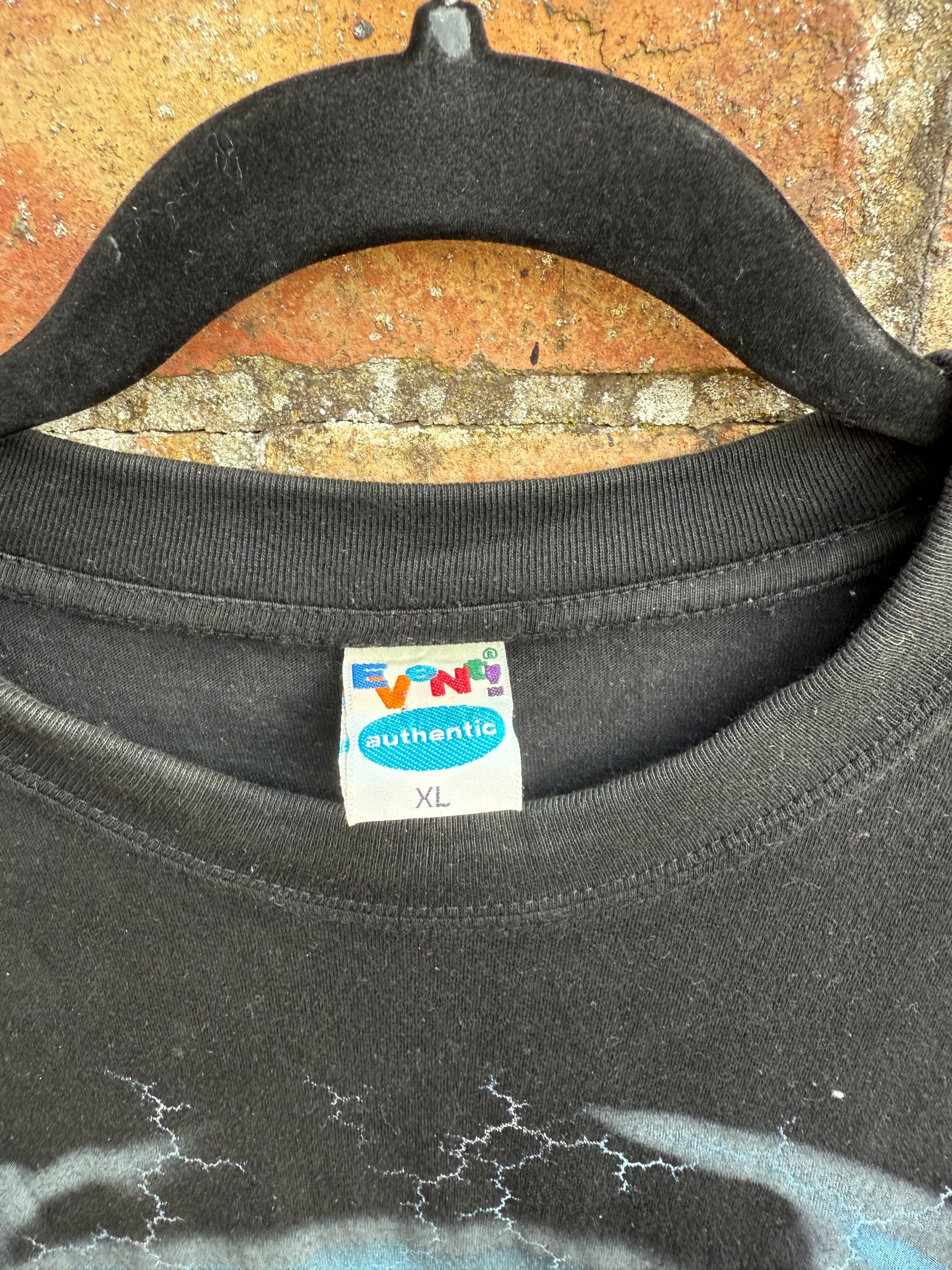 Close-up of Event Authentic t-shirt tag