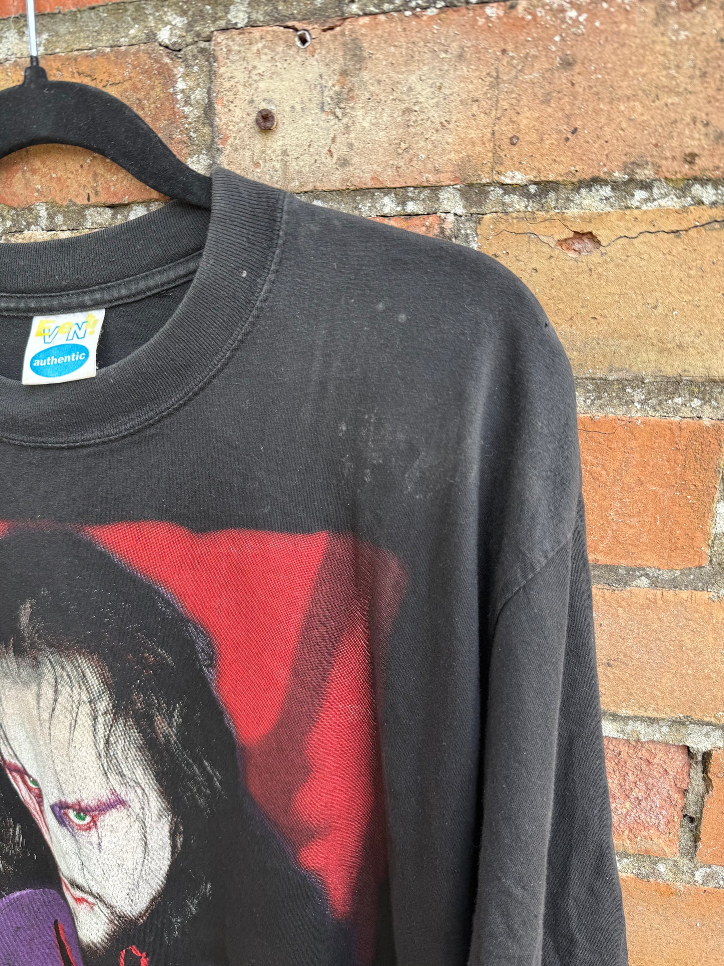 Close-up of t-shirt shoulder area showing some staining to material