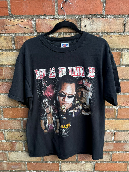 Black t-shirt with red print Raw as we wanna be and images of wrestlers