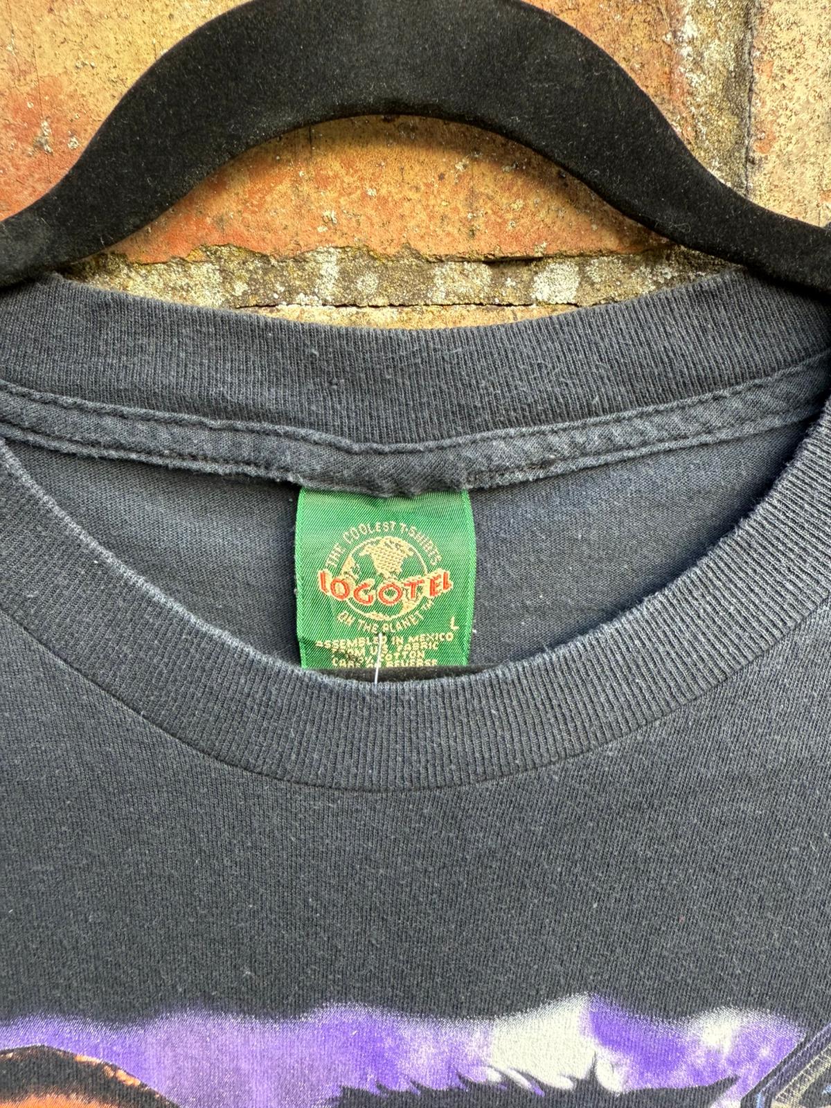 Black t-shirt with green Logotel tag