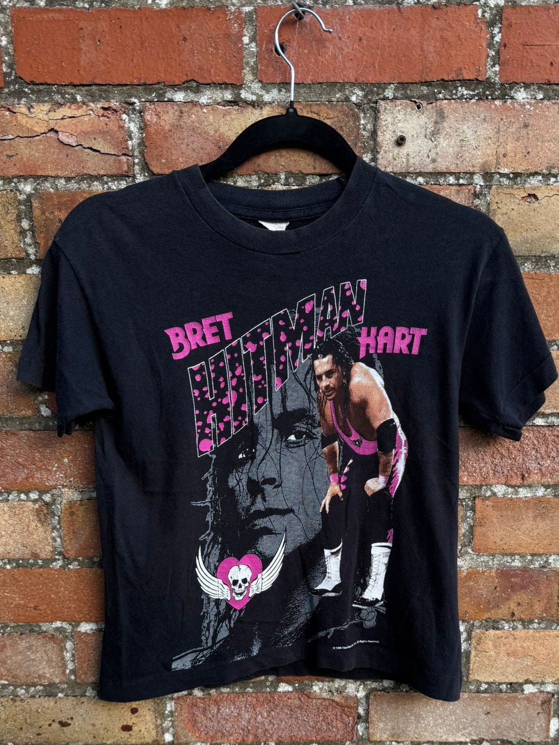 Black WWF t-shirt featuring wrestler Bret the Hitman Hart