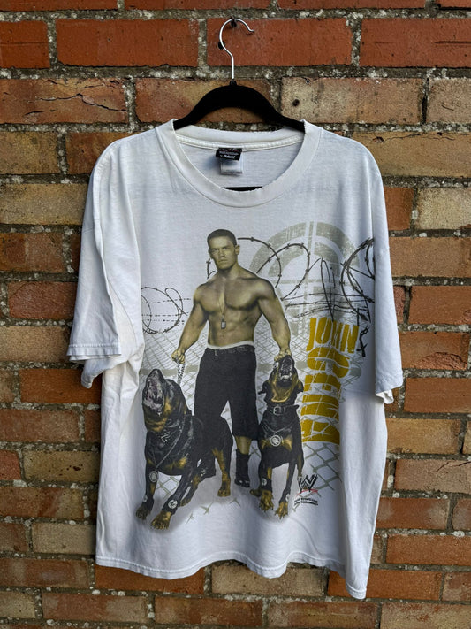 White t-shirt with graphic design of John Cena with two dogs 