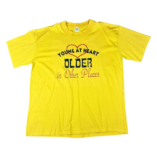 Funny Slogan - Young at Heart Older in Other Places - comedy T-shirt